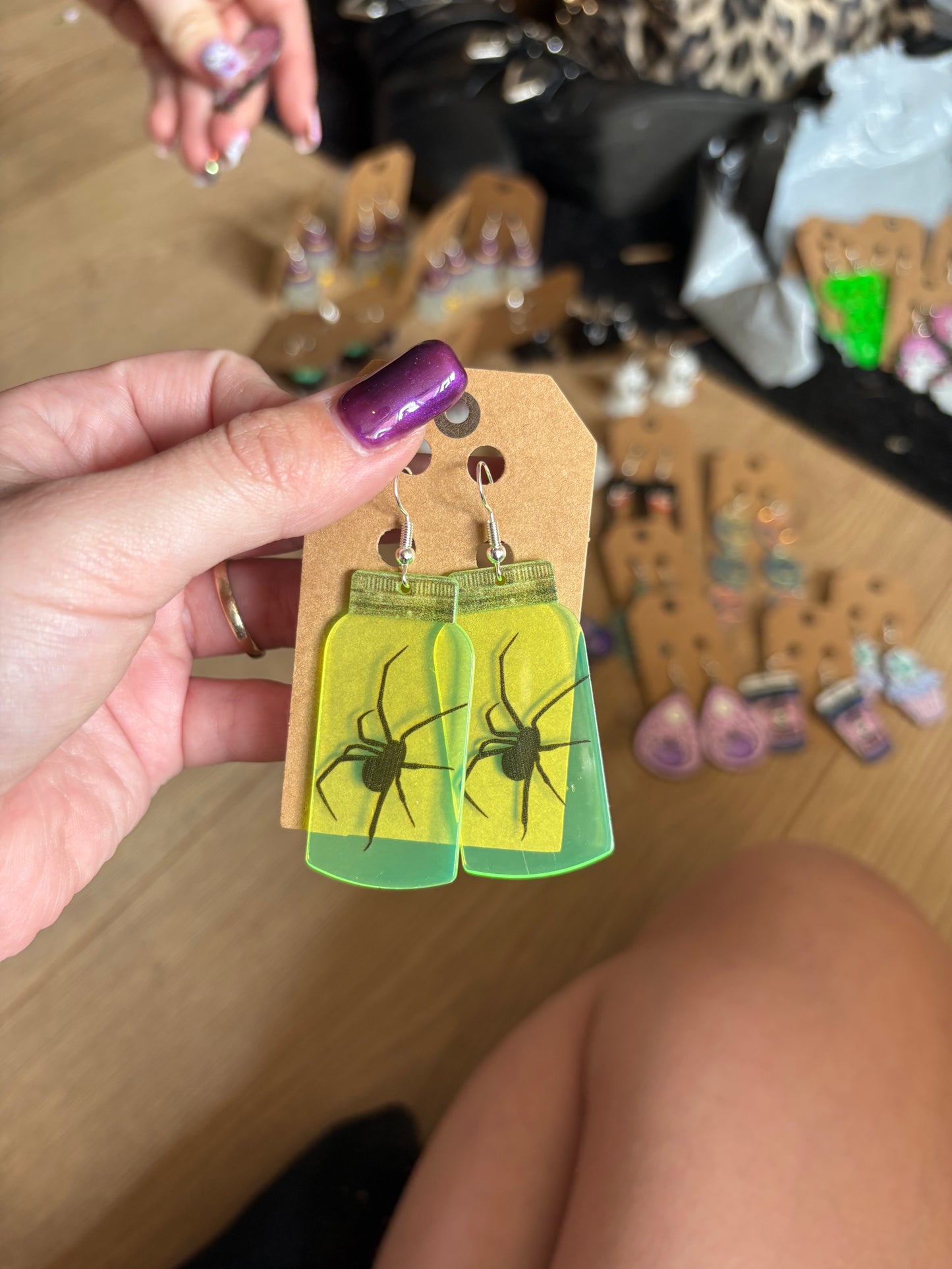 Neon spider earrings