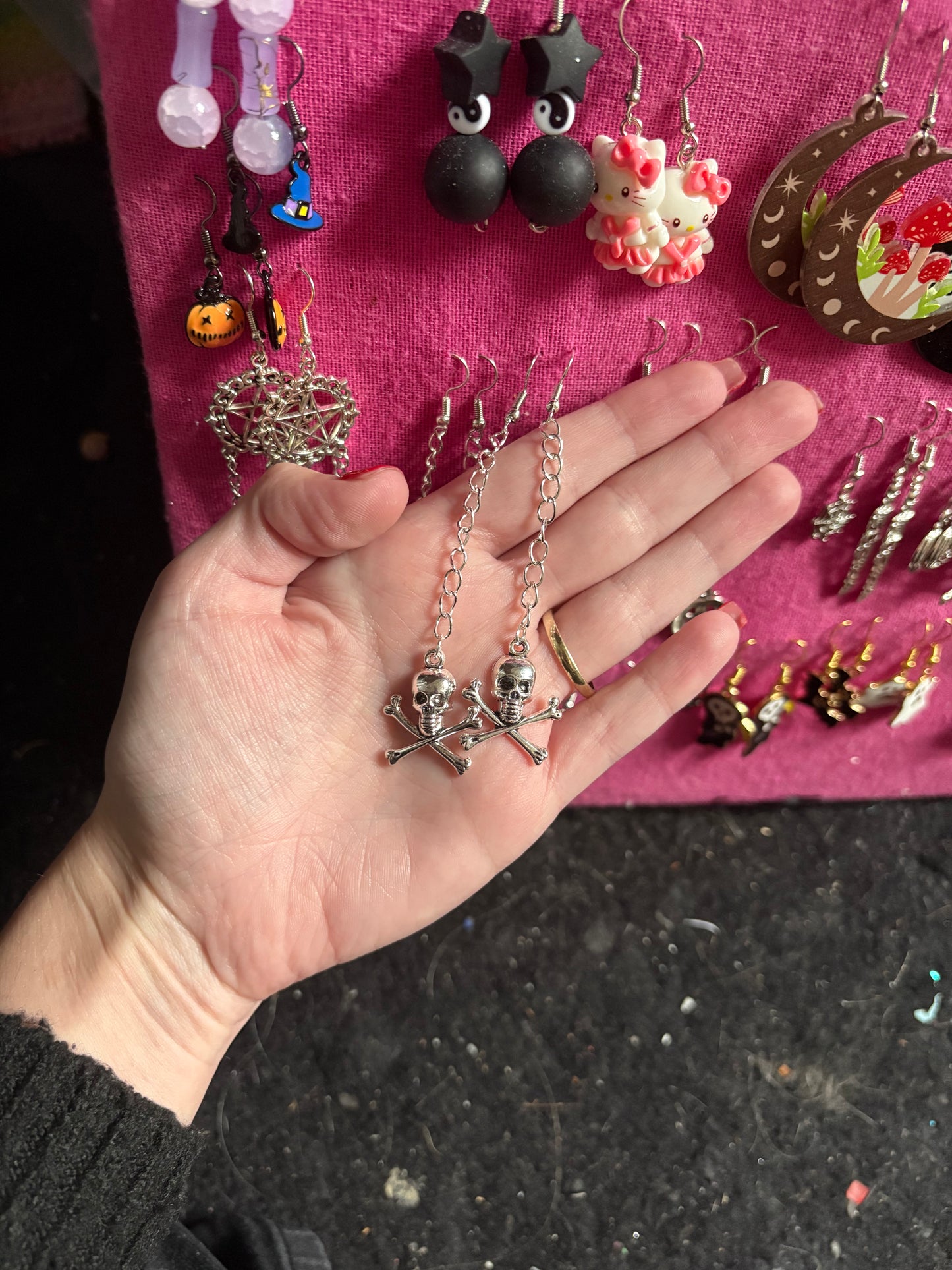 Skull + crossbone chained earrings