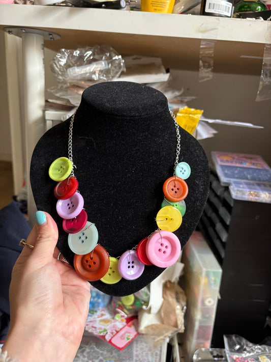 Button necklace with hair clips