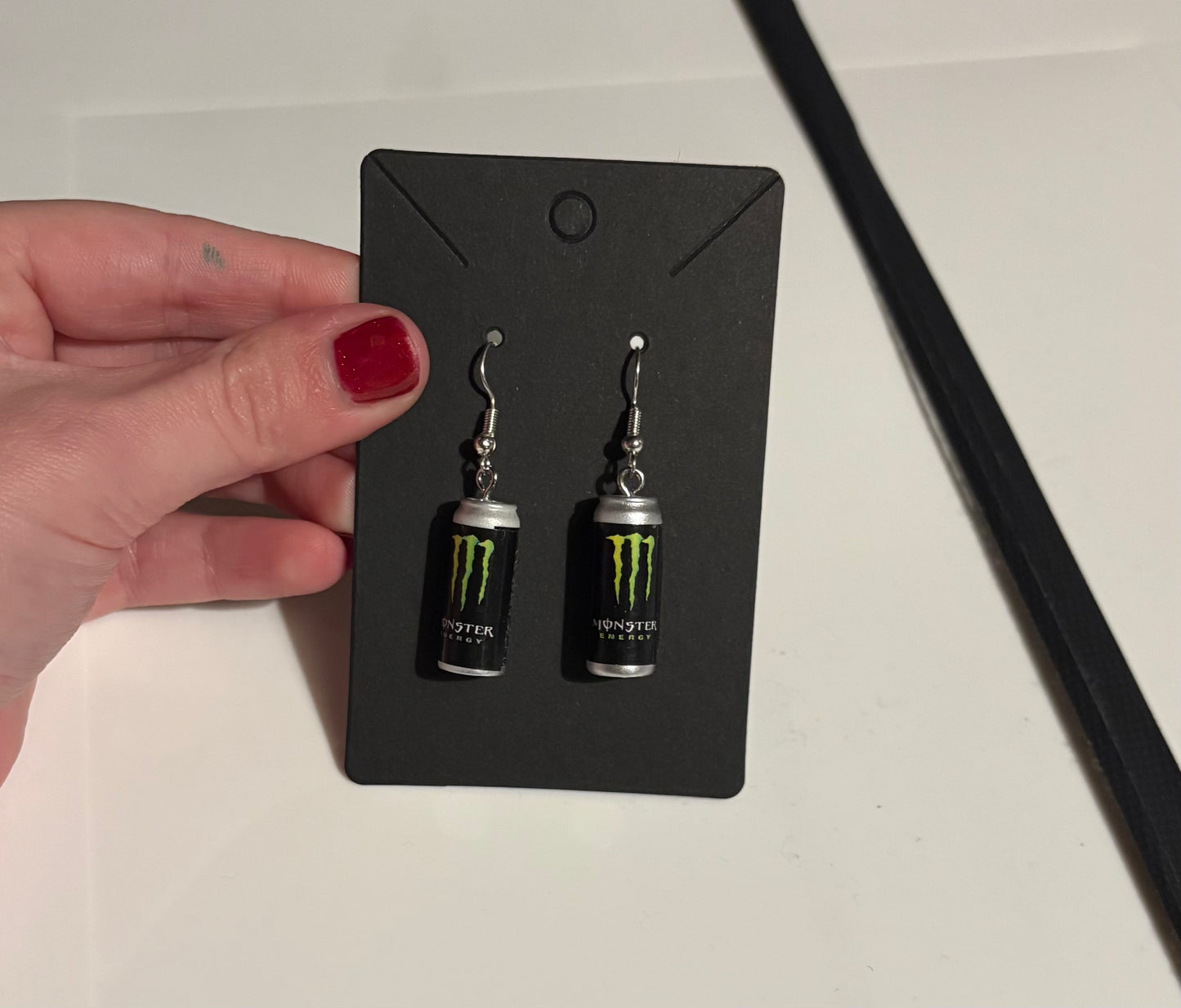 Monster can earrings