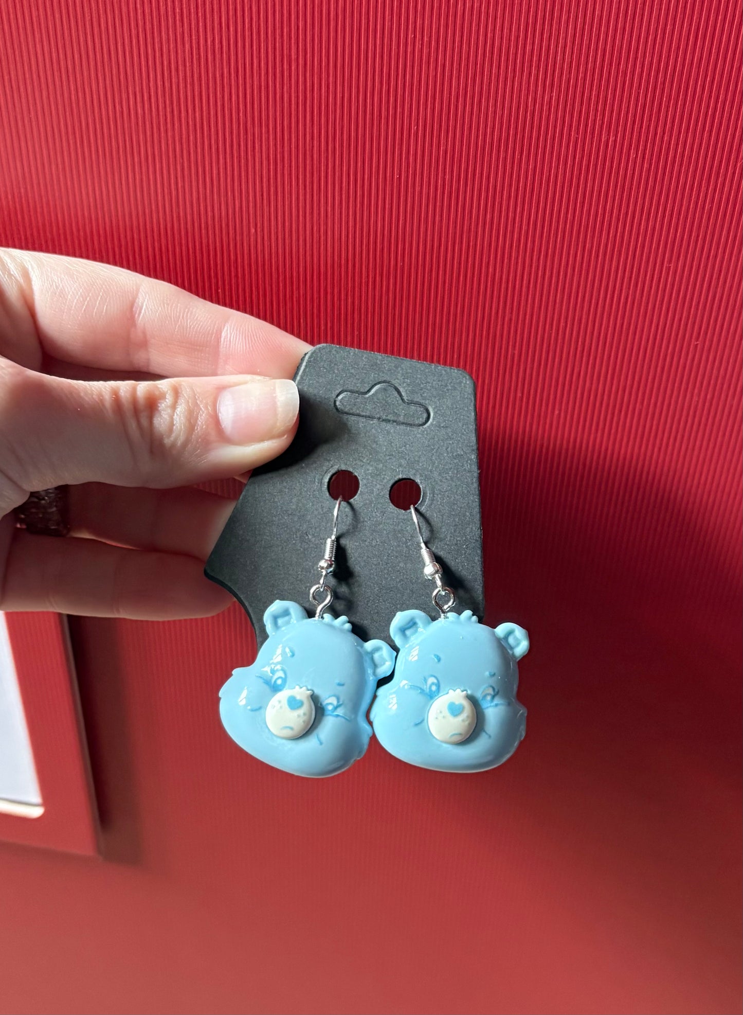 Blue care bear earrings