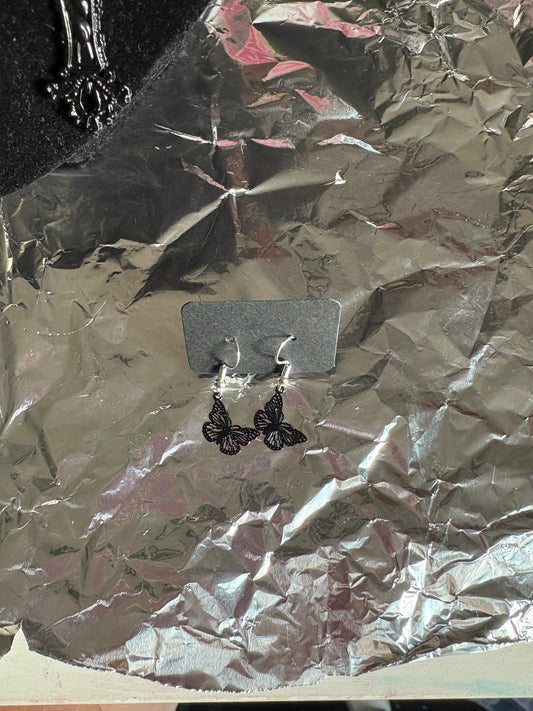 Mini black butterflies