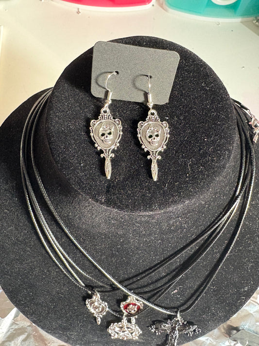 White skull earrings
