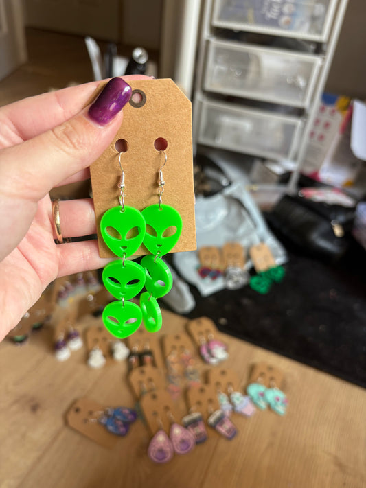 Neon green alien earrings