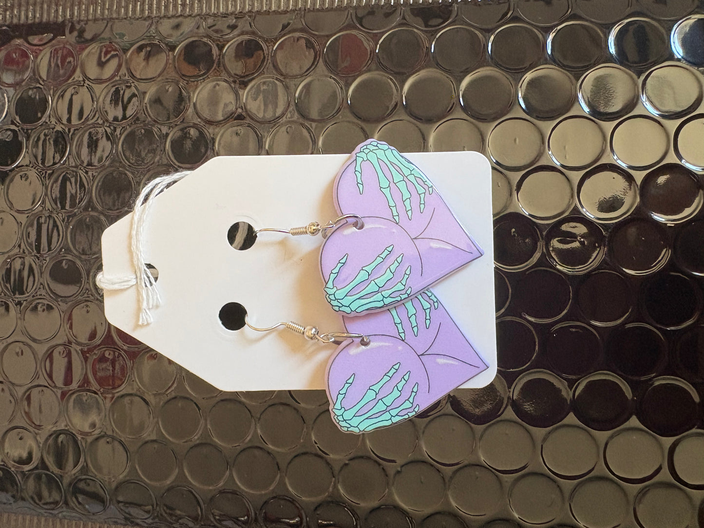 Purple bum earrings