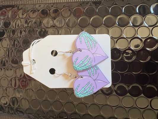 Purple bum earrings