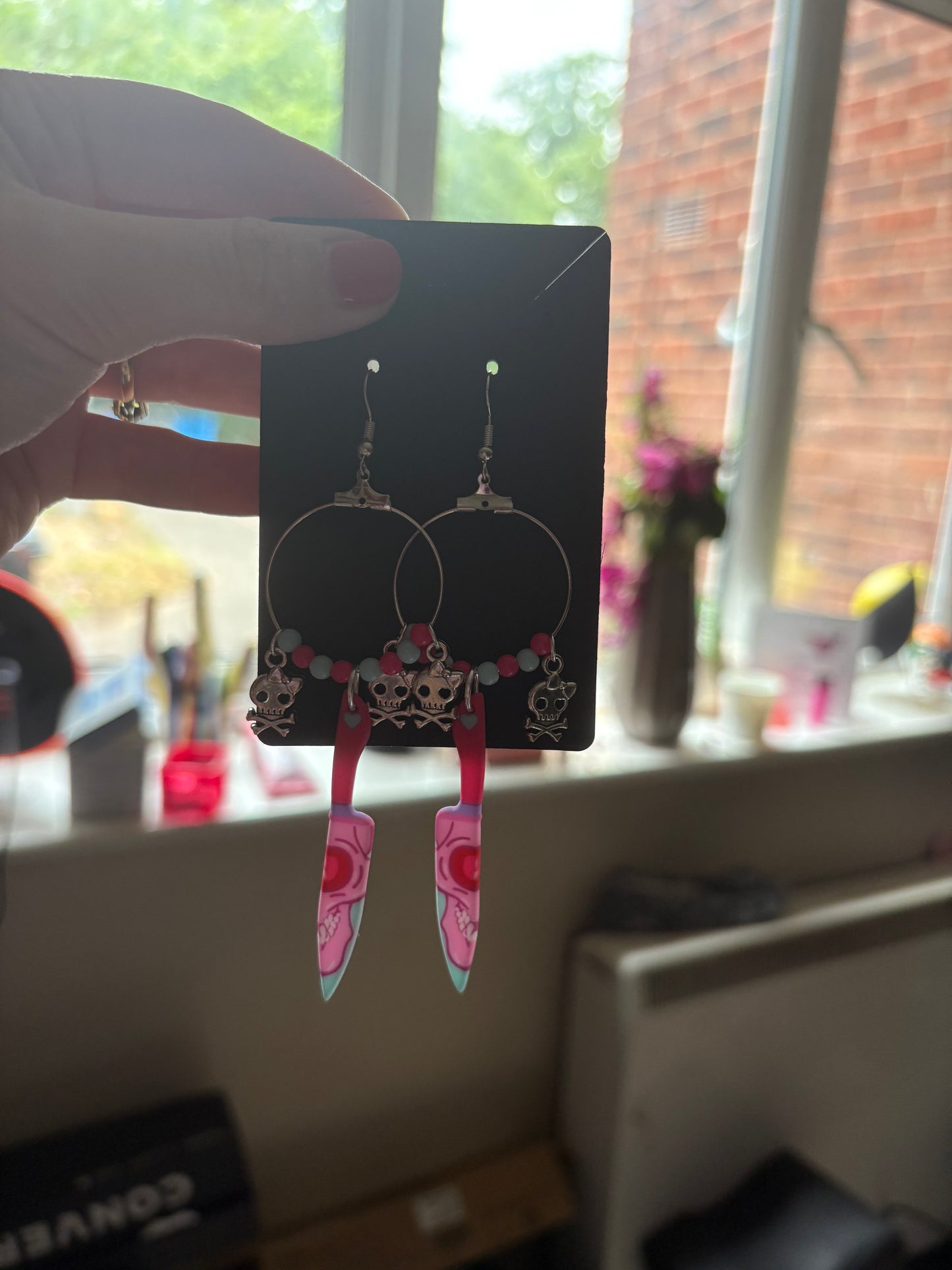 Skull knife hoop earrings
