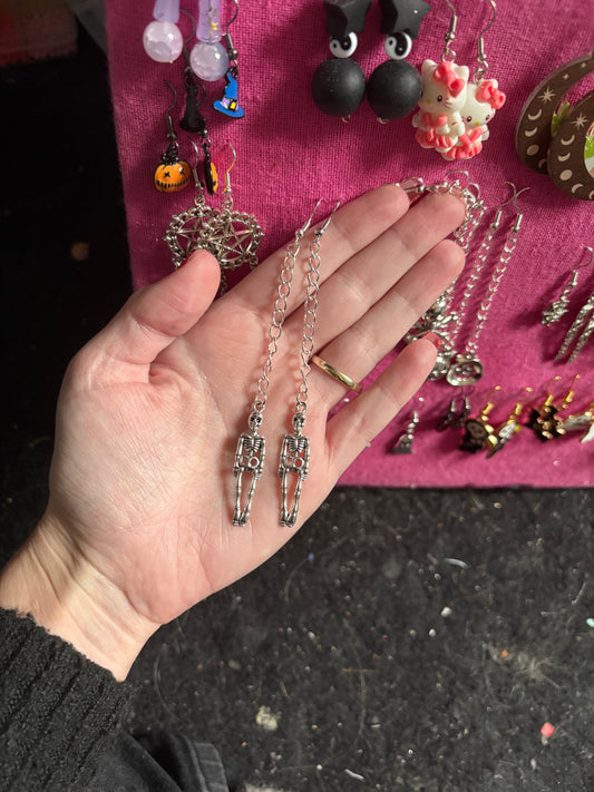 Skeleton body chained earrings
