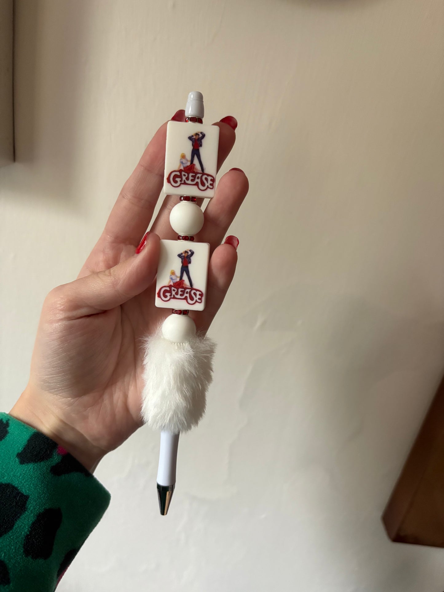 Grease beaded pen