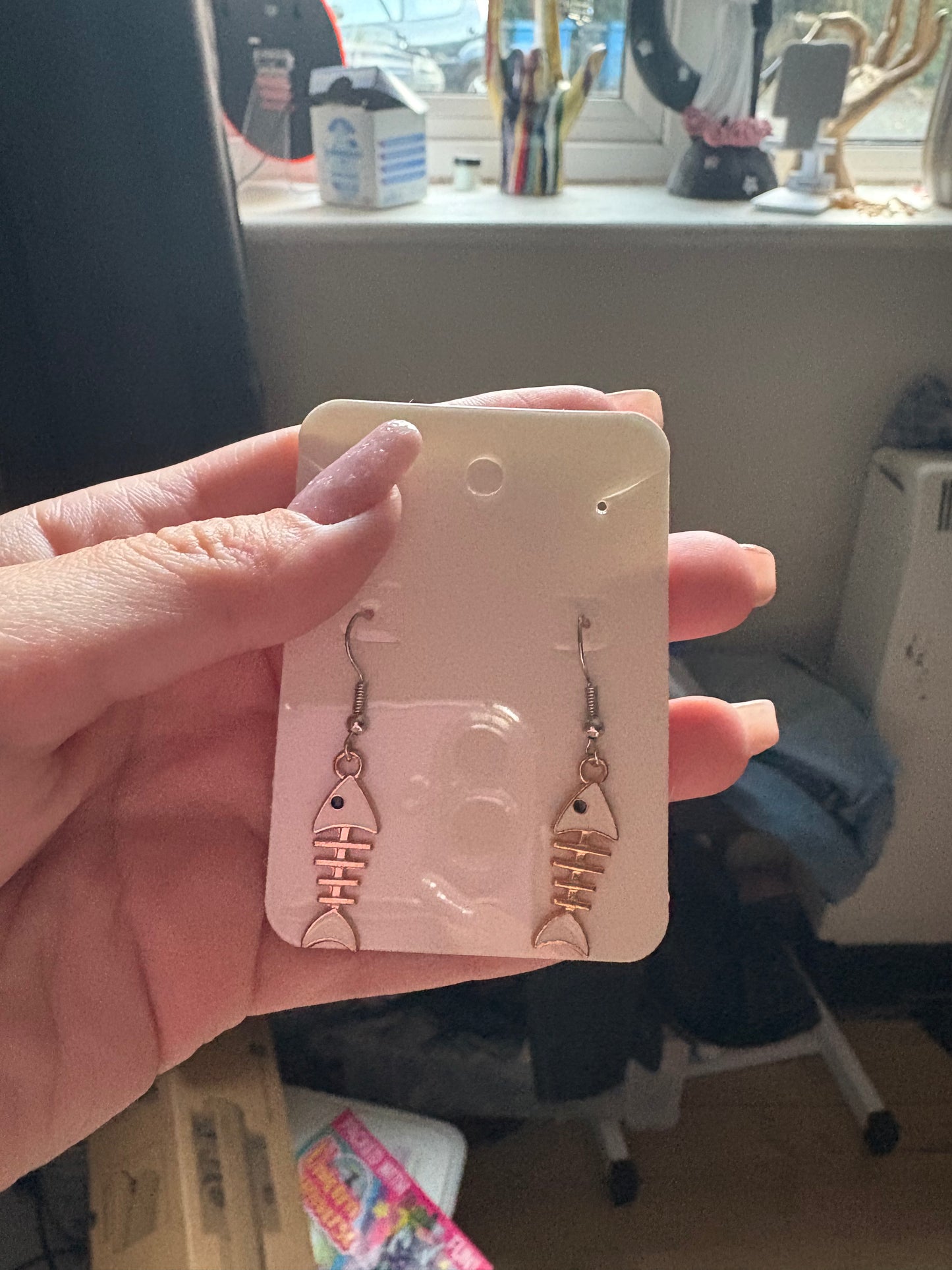 Dead fish earrings